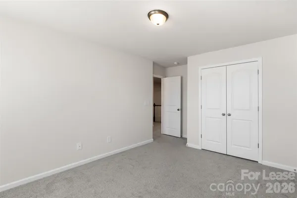 a bathroom with a sink double vanity and a mirror