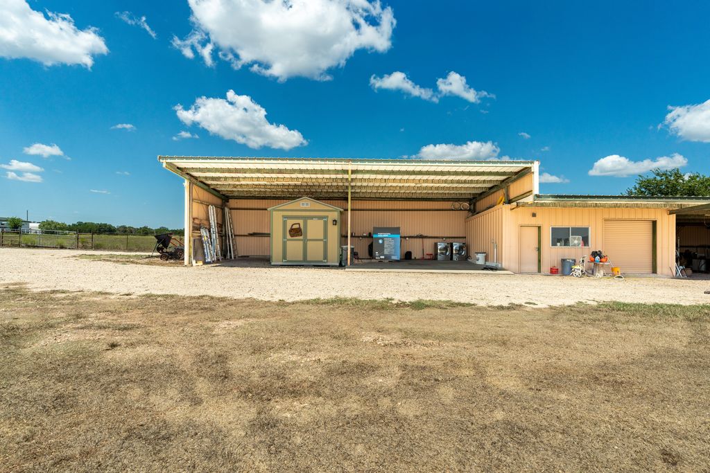 3550 County Road 245 Florence, TX 76527 - Photo 23 of 38 Metal Equipment shed offers a ton of storage for Hay & Equipment with a dedicated office and more enclosed storage. All areas offer a dedicated pathway and parking. 18 Wheeler trucks haul in hay an materials with room to unload an turn around. Every details has been captured to Make Your Move Complete!