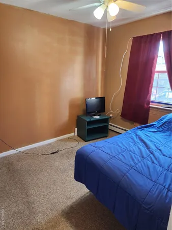 a room with furniture and a window