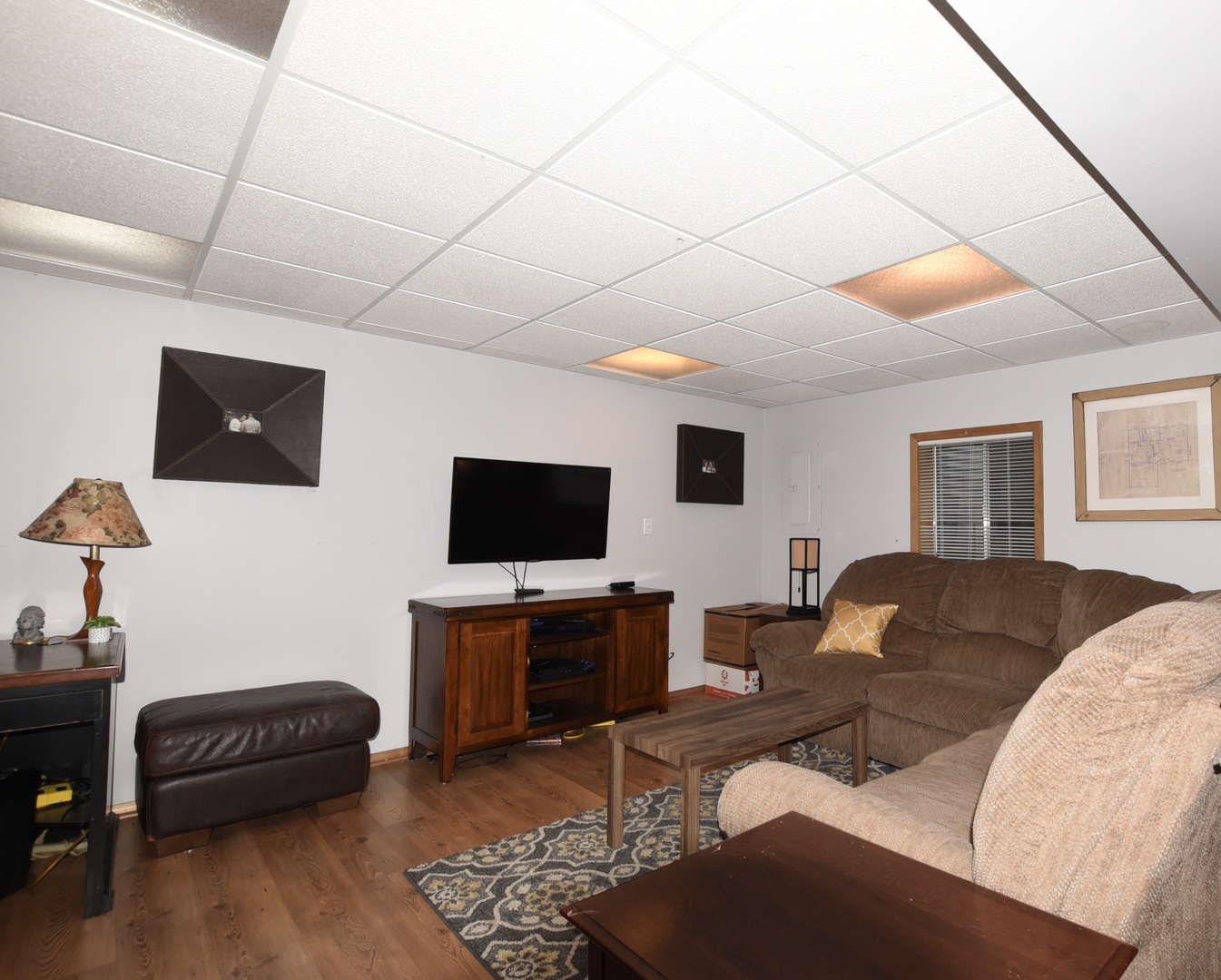 1011 Cardinal Drive Zion, IL 60099 - Photo 15 of 23 a living room with furniture a flat screen tv and a window