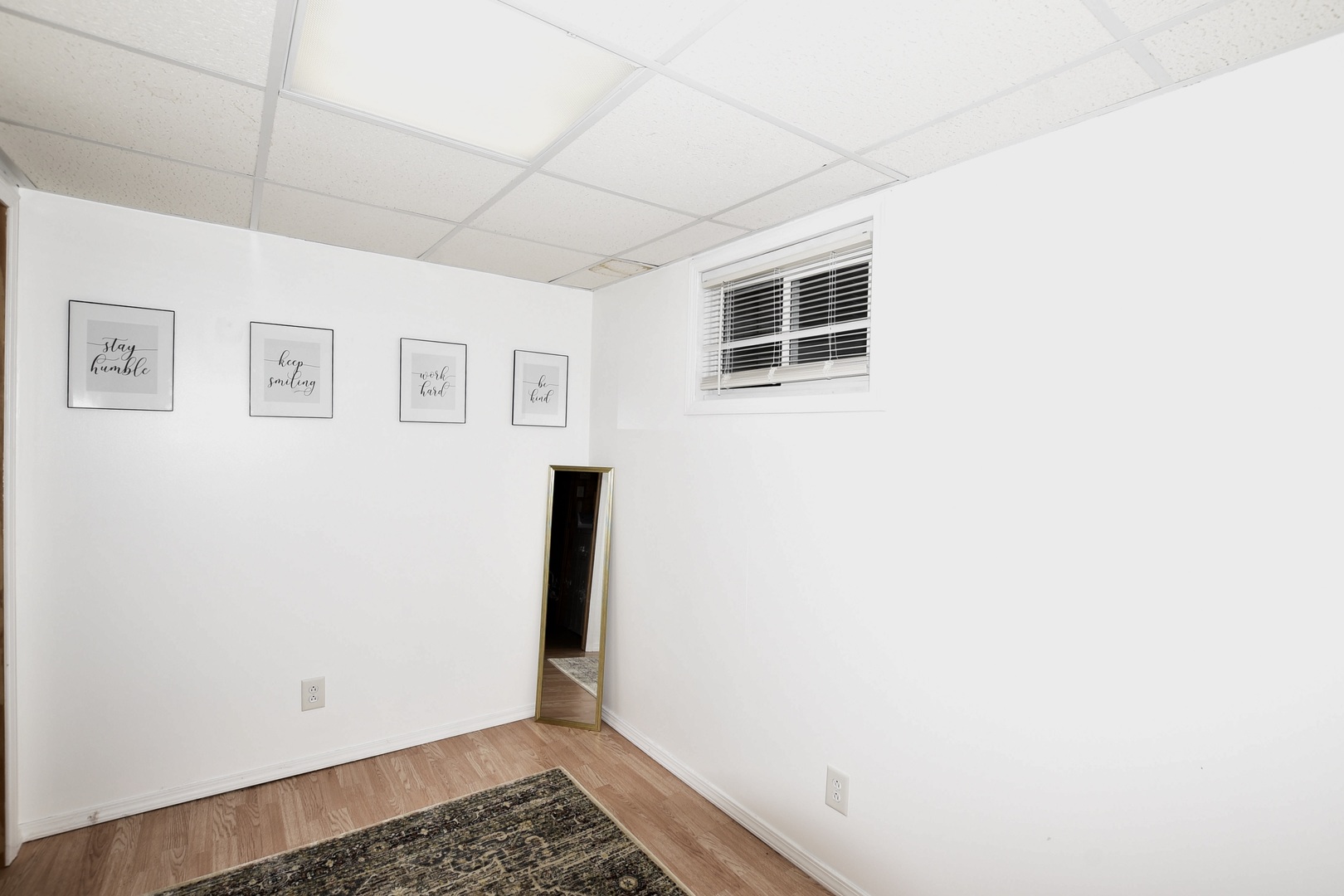1011 Cardinal Drive Zion, IL 60099 - Photo 18 of 23 a view of a hallway with wooden floor