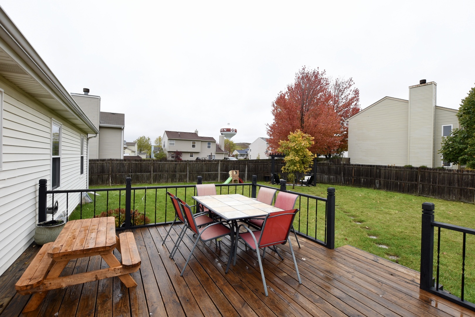 1011 Cardinal Drive Zion, IL 60099 - Photo 20 of 23 a view of a chairs and table on the deck