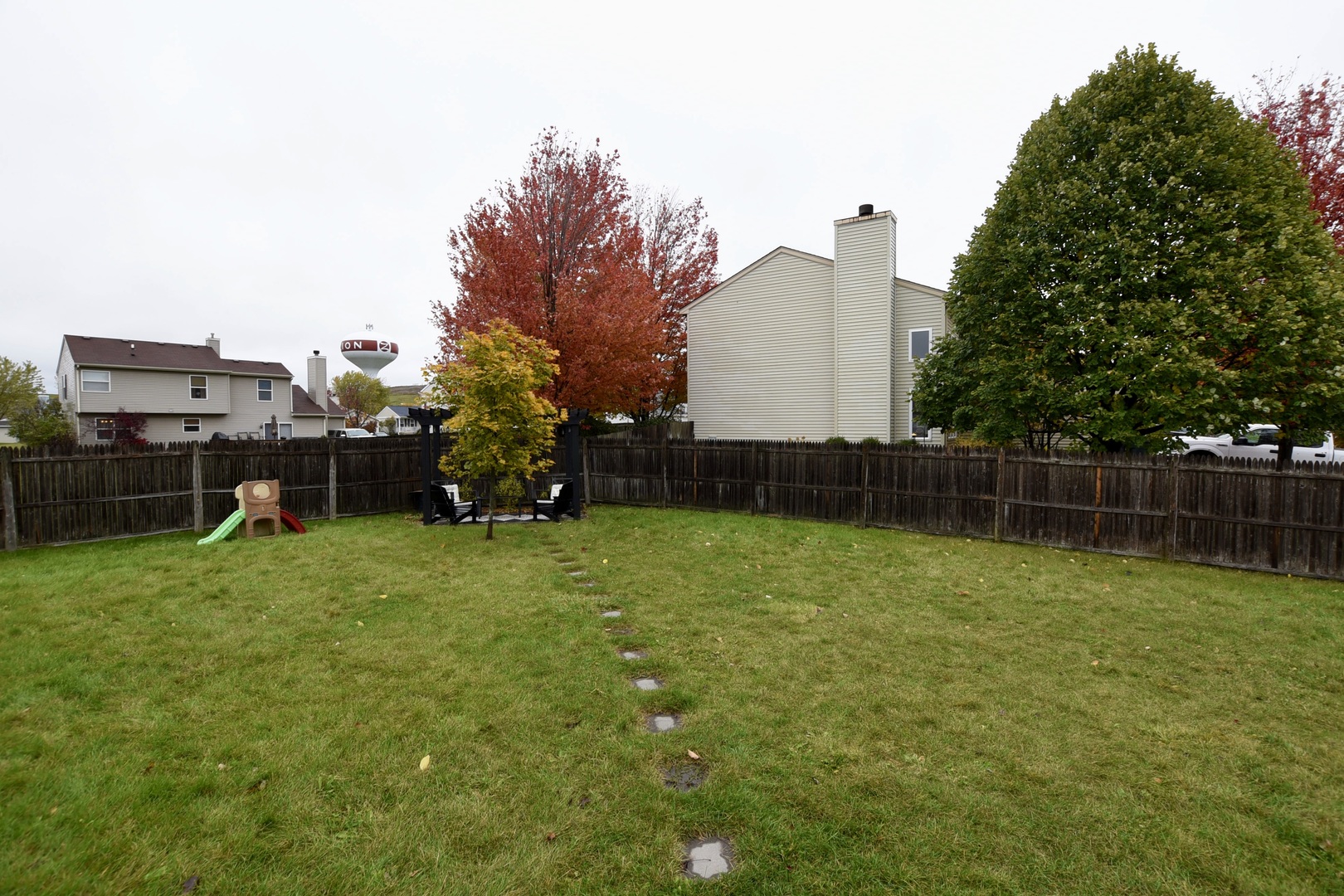1011 Cardinal Drive Zion, IL 60099 - Photo 22 of 23 a backyard of a house with lots of green space