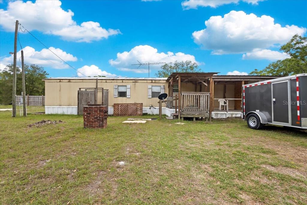 3100 Northwest 20th Street Bell, FL 32619 - Photo 11 of 39 a view of a house with backyard
