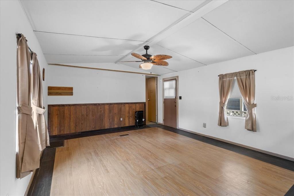 3100 Northwest 20th Street Bell, FL 32619 - Photo 23 of 39 a view of a livingroom with wooden floor