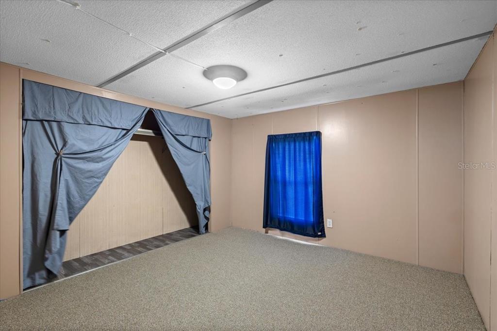 3100 Northwest 20th Street Bell, FL 32619 - Photo 26 of 39 a view of an empty room with a fireplace