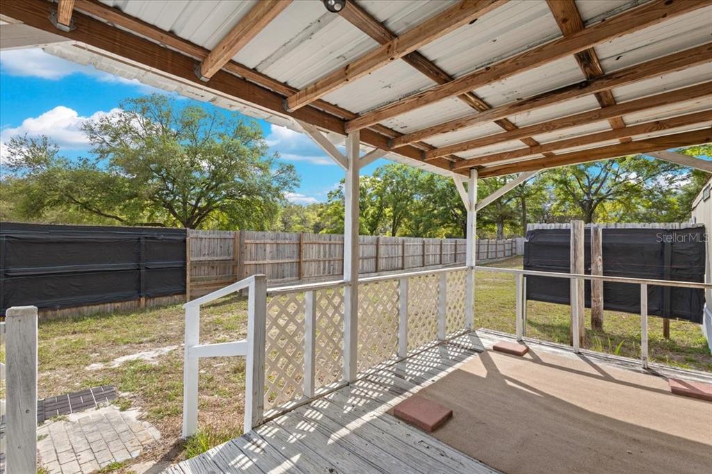 3100 Northwest 20th Street Bell, FL 32619 - Photo 28 of 39 a view of outdoor space with wooden fence