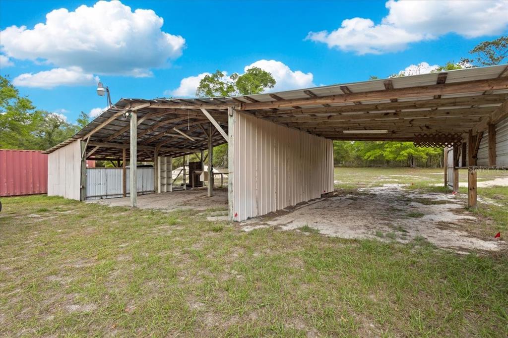3100 Northwest 20th Street Bell, FL 32619 - Photo 5 of 39 a view of a wooden fence with a big yard