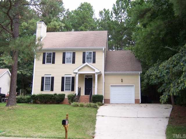 7229 Mine Shaft Road Raleigh, NC 27615 - Photo 1 of 6 a front view of a house with a yard