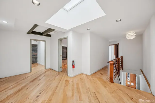 a very nice looking room with wooden floor