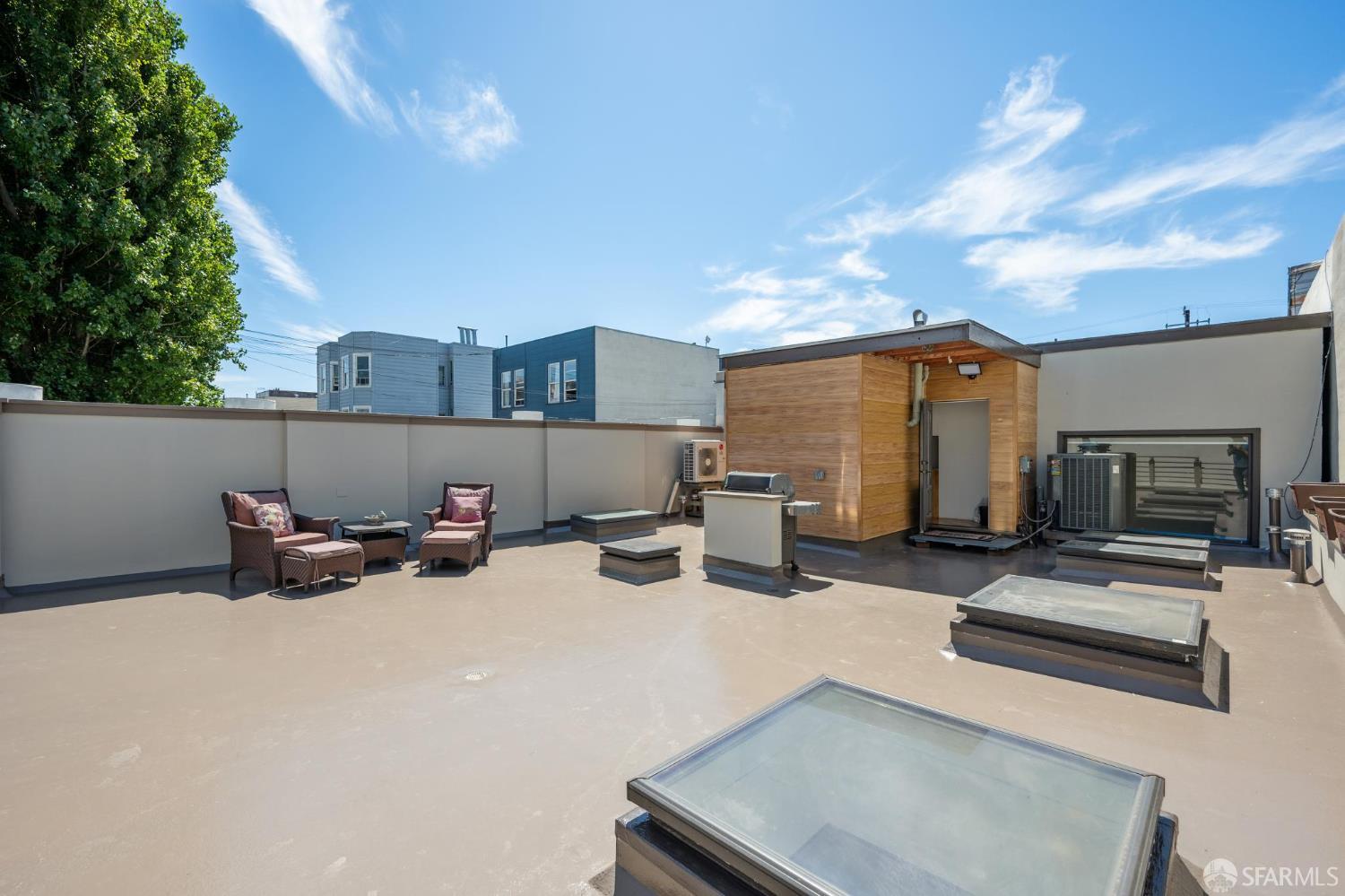 335 South Van Ness Avenue San Francisco, CA 94103 - Photo 16 of 17 a view of a patio with a table and chairs
