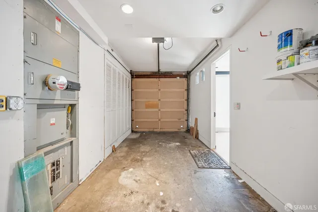 a view of a hallway view with wooden floor and entryway