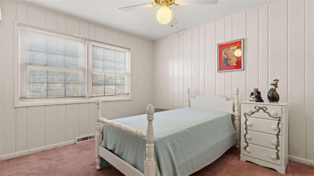 8 Lakemoore Drive Northeast Rome, GA 30161 - Photo 15 of 44 a bedroom with a bed and a window