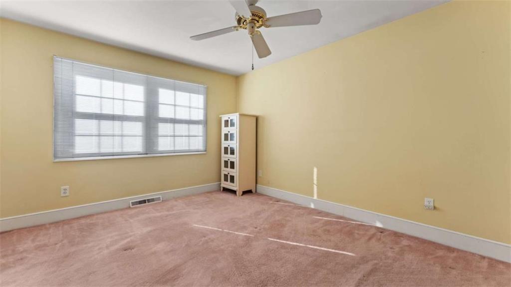 8 Lakemoore Drive Northeast Rome, GA 30161 - Photo 19 of 44 an empty room with windows