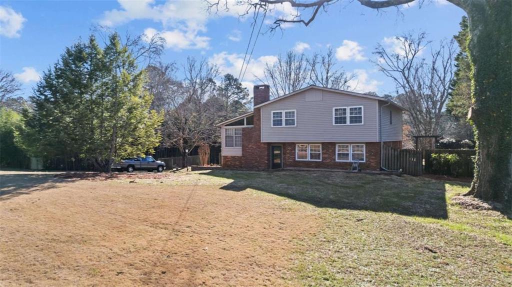 8 Lakemoore Drive Northeast Rome, GA 30161 - Photo 2 of 44 a view of a house with a yard covered in snow
