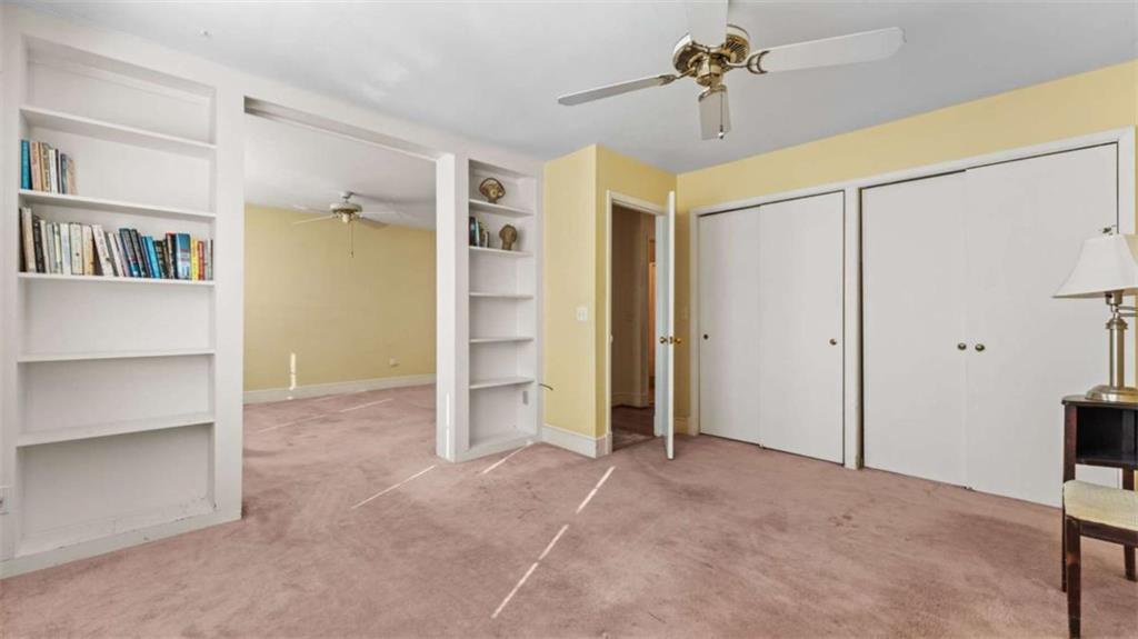8 Lakemoore Drive Northeast Rome, GA 30161 - Photo 21 of 44 a view of empty room with a ceiling fan