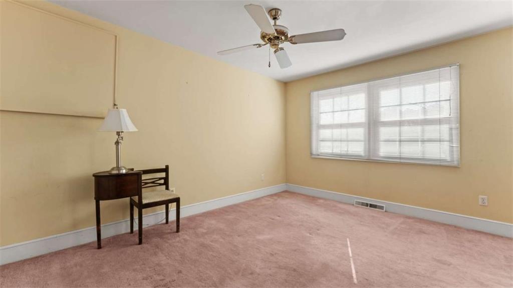 8 Lakemoore Drive Northeast Rome, GA 30161 - Photo 22 of 44 a view of an empty room with a window