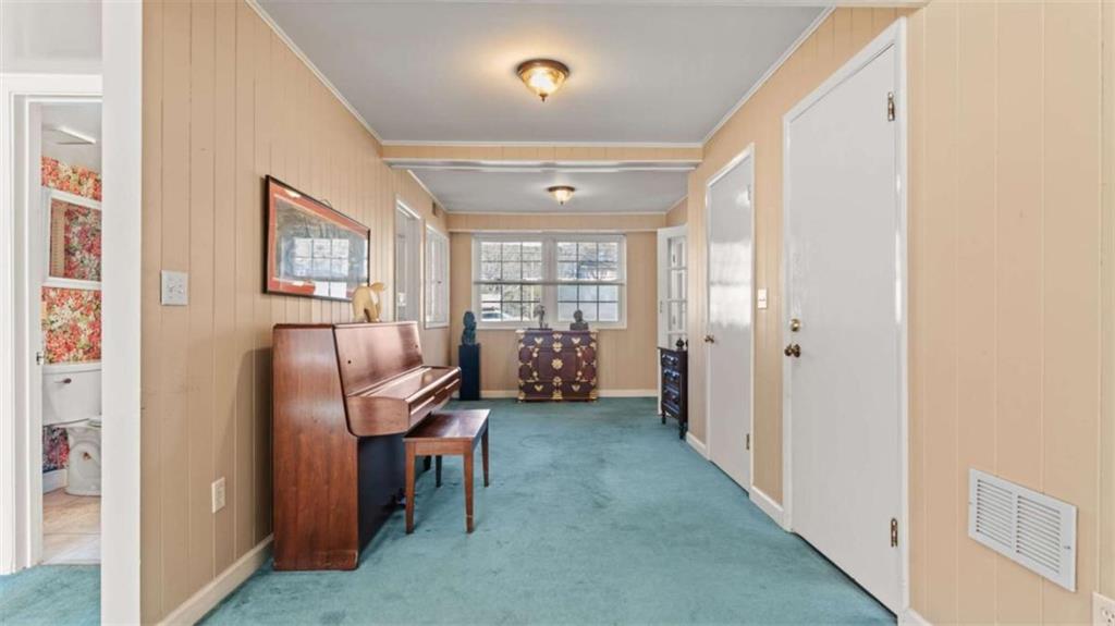 8 Lakemoore Drive Northeast Rome, GA 30161 - Photo 27 of 44 a view of a hallway with furniture and windows