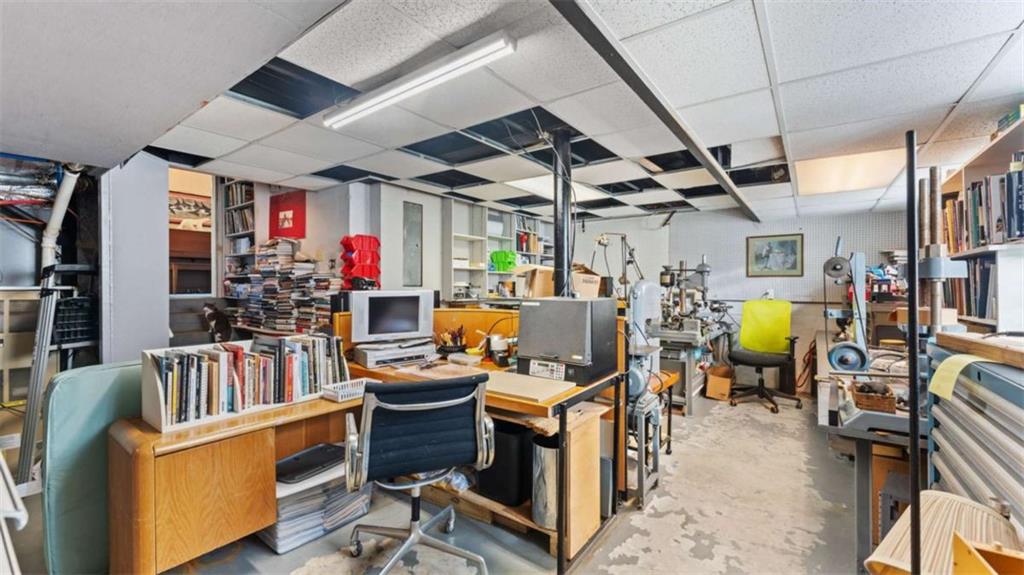 8 Lakemoore Drive Northeast Rome, GA 30161 - Photo 32 of 44 a living room with lots of furniture and a chandelier