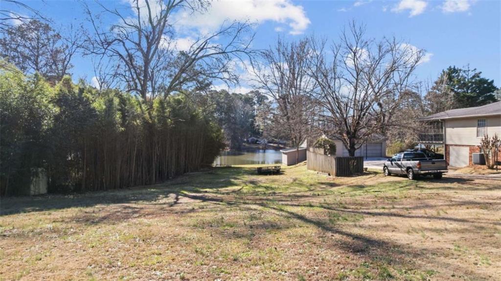 8 Lakemoore Drive Northeast Rome, GA 30161 - Photo 42 of 44 a house with trees in front of it
