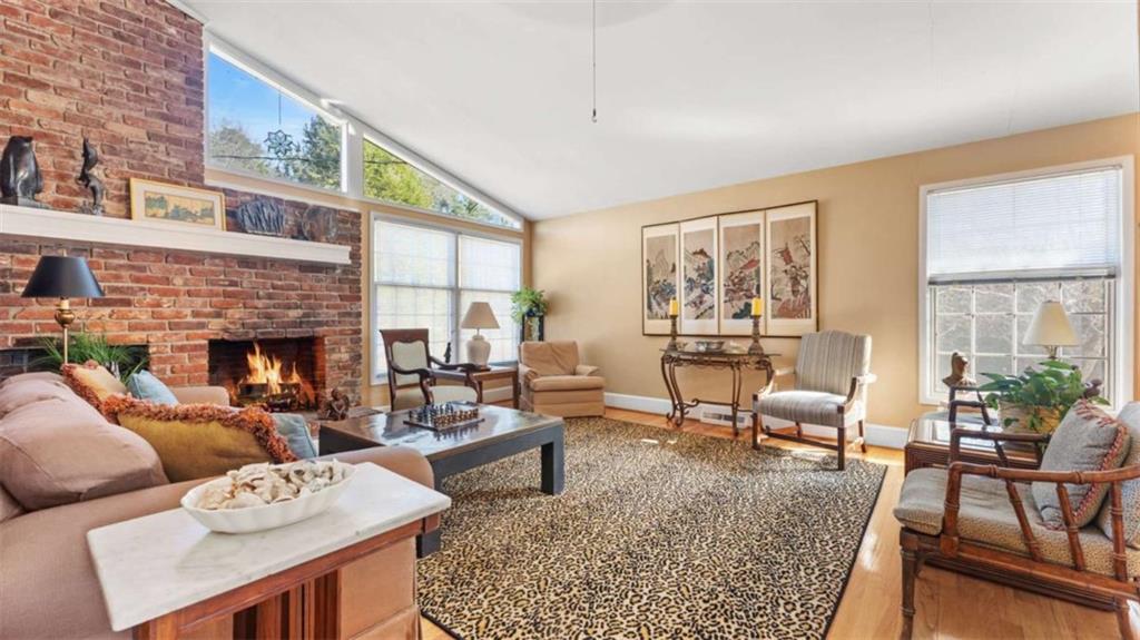8 Lakemoore Drive Northeast Rome, GA 30161 - Photo 5 of 44 a living room with furniture and a fireplace