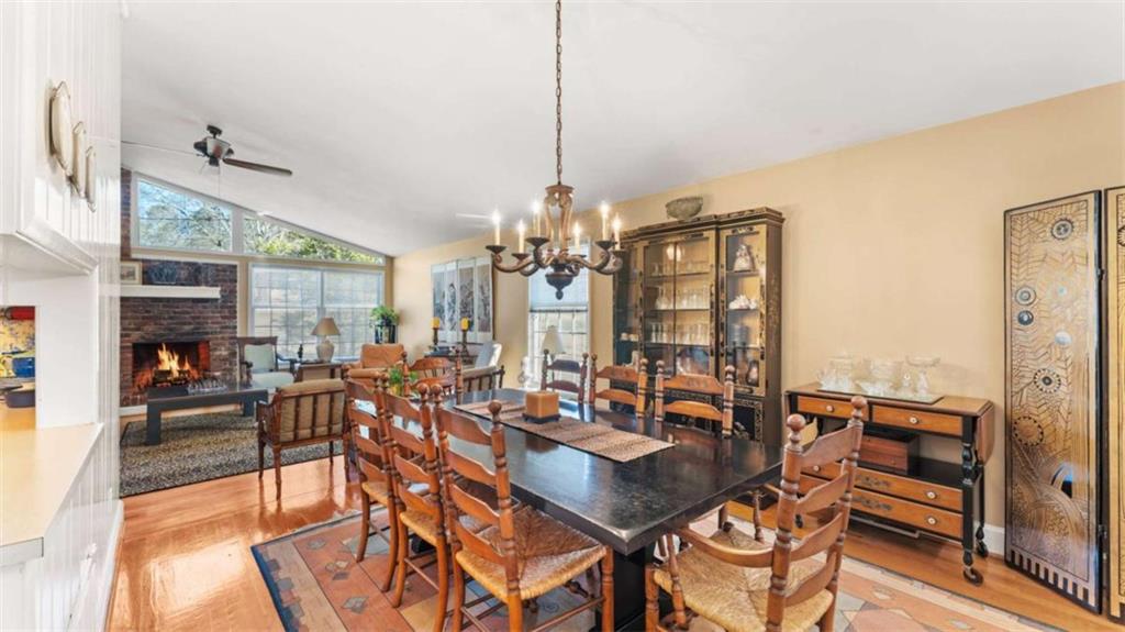 8 Lakemoore Drive Northeast Rome, GA 30161 - Photo 8 of 44 a view of a dining room with furniture and chandelier