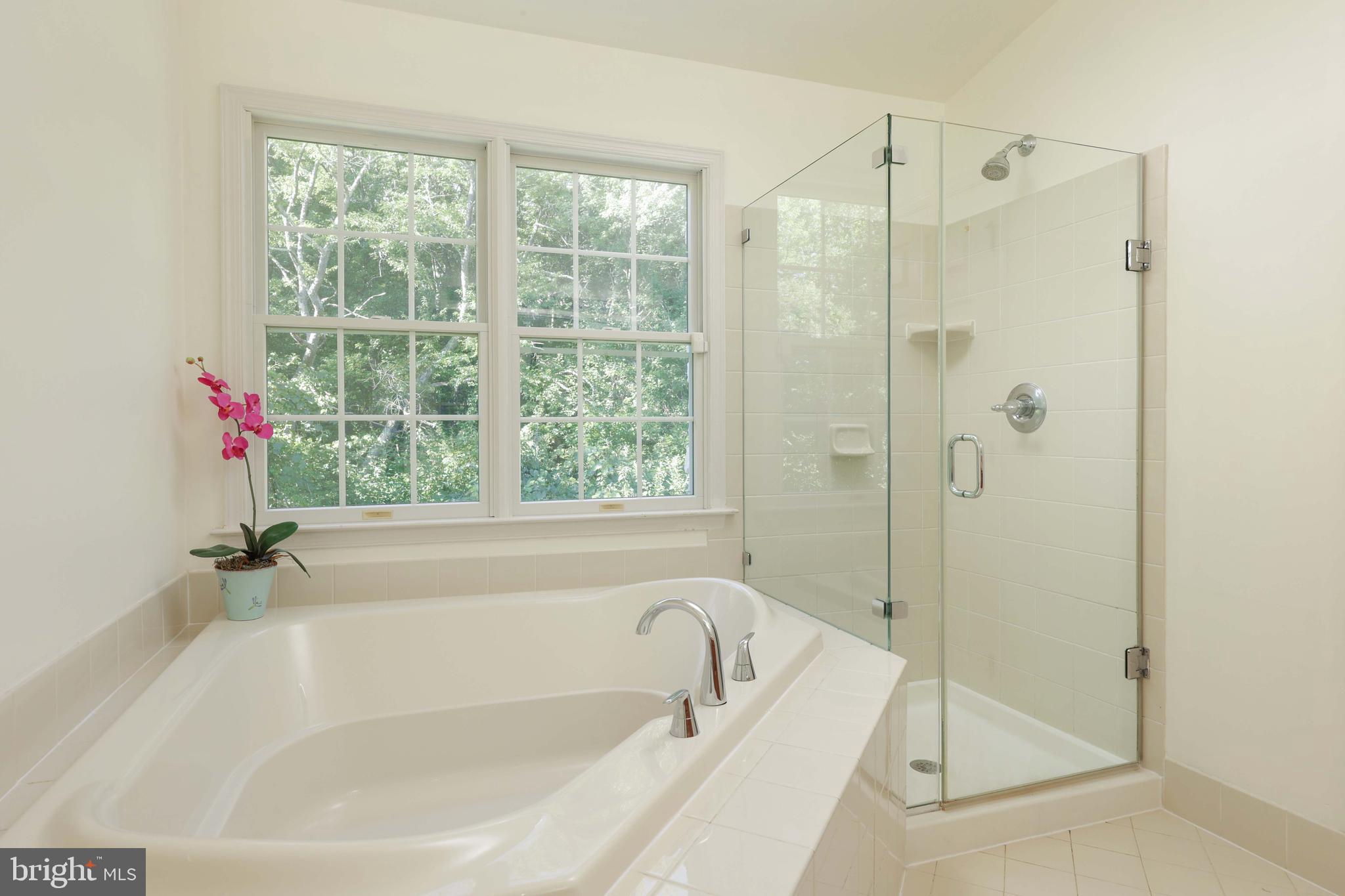 11 Wedgewood Court Princeton, NJ 08540 - Photo 23 of 40 a white bath tub sitting next to a shower