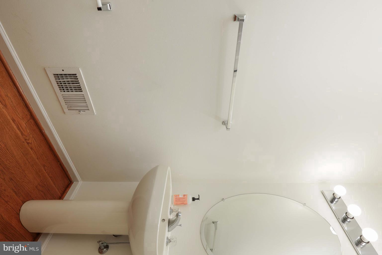 11 Wedgewood Court Princeton, NJ 08540 - Photo 28 of 40 a bathroom with a sink and toilet