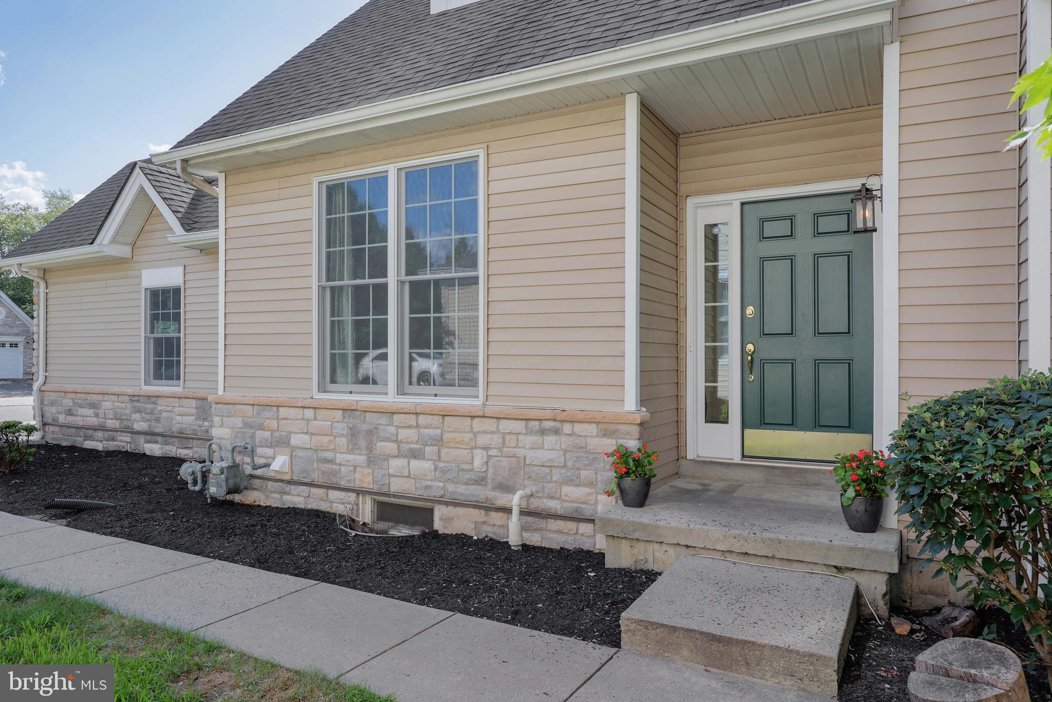 11 Wedgewood Court Princeton, NJ 08540 - Photo 3 of 40 a front view of a house with a yard