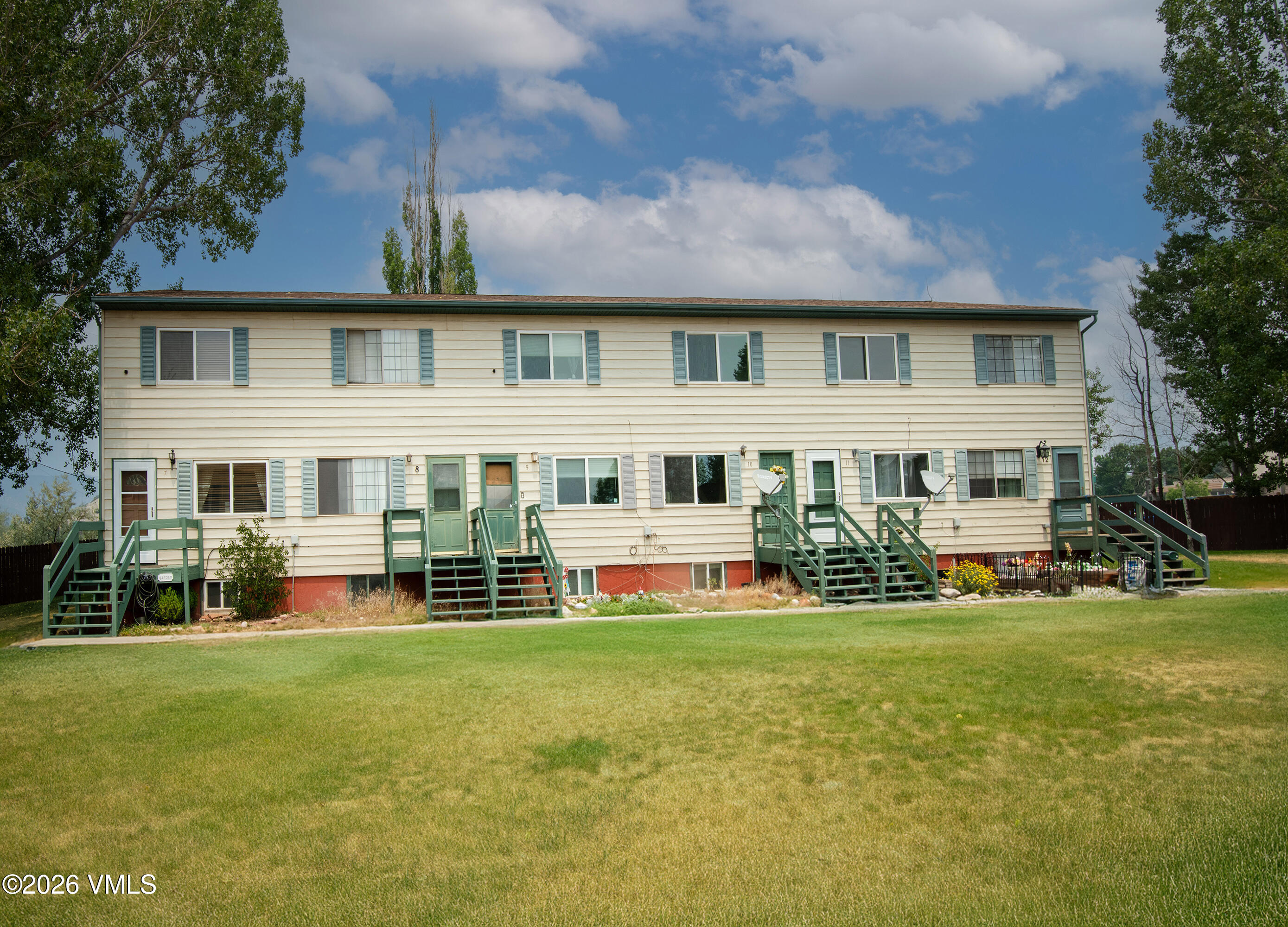 85 Chambers Avenue, Unit 10 Eagle, CO 81631 - Photo 32 of 41 a front view of house with yard