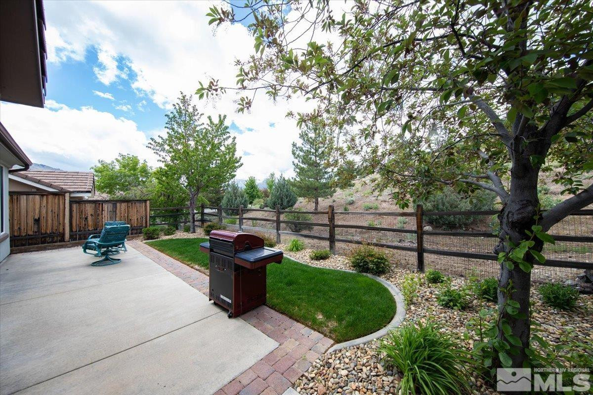 1205 Firefly Court Reno, NV 89523 - Photo 31 of 39 a view of a backyard with sitting area