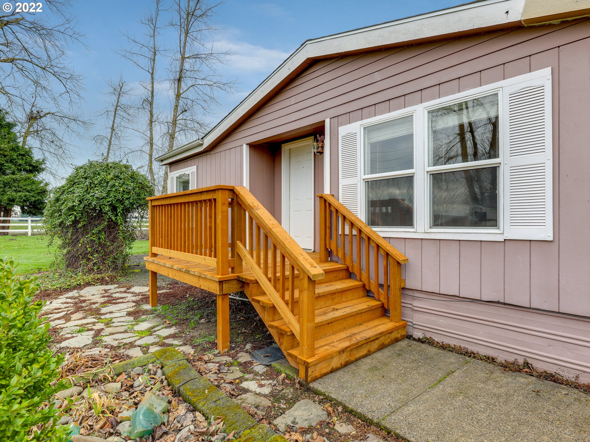 8489 South Gribble Road Canby, OR 97013 - Photo 5 of 32 a view of a house with backyard and wooden floor