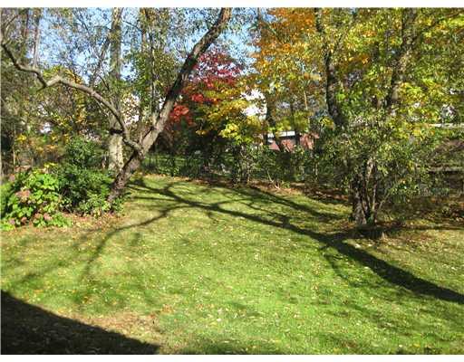 226 Churchill Road Turtle Creek, PA 15145 - Photo 12 of 17 Exterior Back. PARKLIKE PRIVATE FENCED YARD MATURED TREES