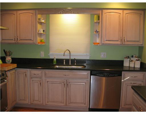 226 Churchill Road Turtle Creek, PA 15145 - Photo 6 of 17 Kitchen. VIEW OF PARKLIKE YARD FROM KITCHEN SINK