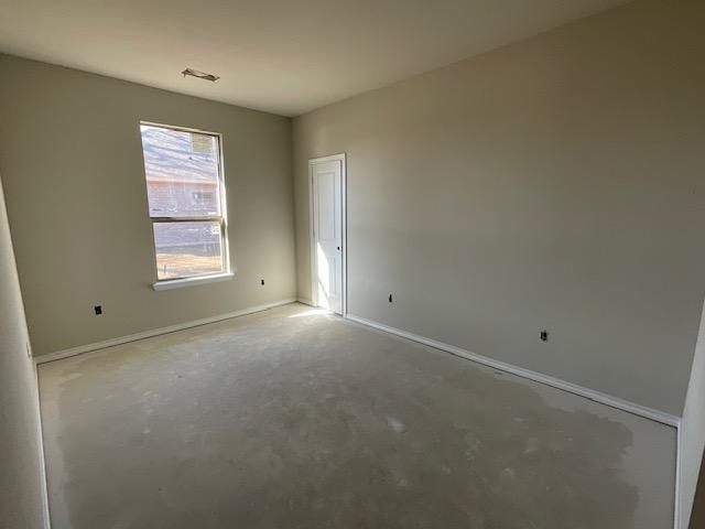 1203 Anthony Street Gainesville, TX 76240 - Photo 19 of 24 a view of empty room with windows