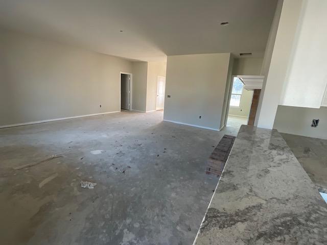 1203 Anthony Street Gainesville, TX 76240 - Photo 9 of 24 a view of a big room with closet and mirror