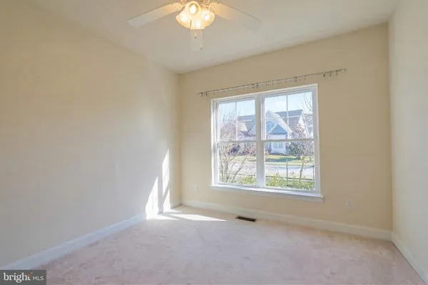 a front view of a house with swimming pool