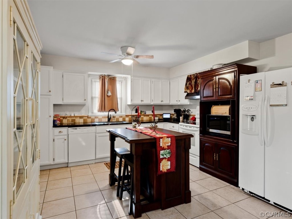 2601 Colgrave Road Midlothian, VA 23112 - Photo 8 of 21 a kitchen with stainless steel appliances granite countertop a refrigerator and a stove top oven