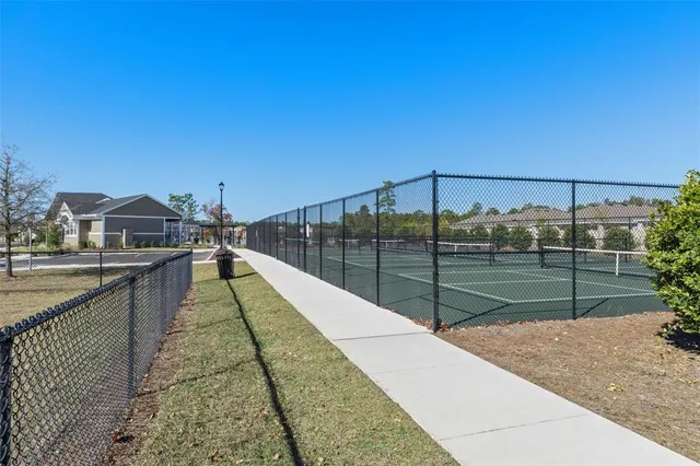 a view of balcony with wooden floor