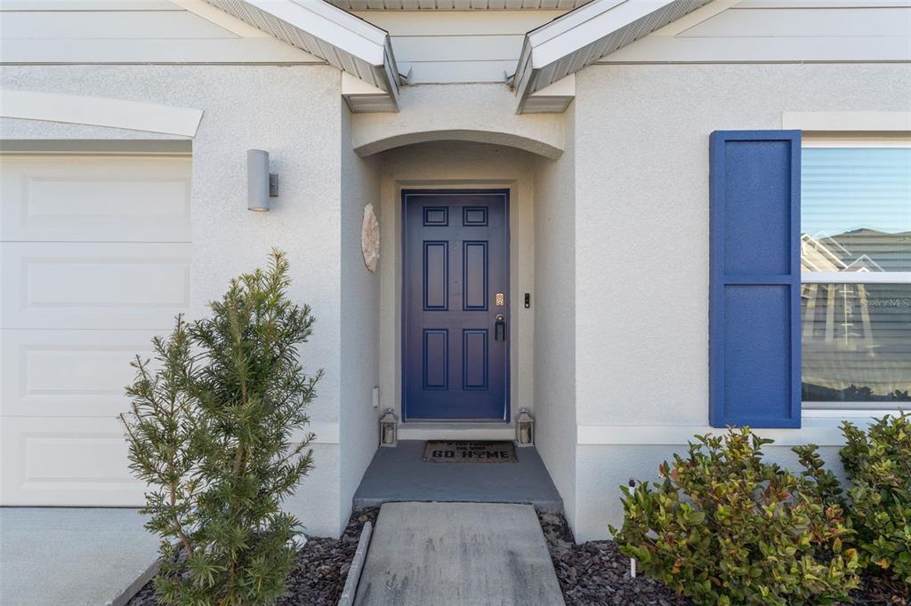 7514 Gardner Street Brooksville, FL 34613 - Photo 5 of 49 a view of front door of house