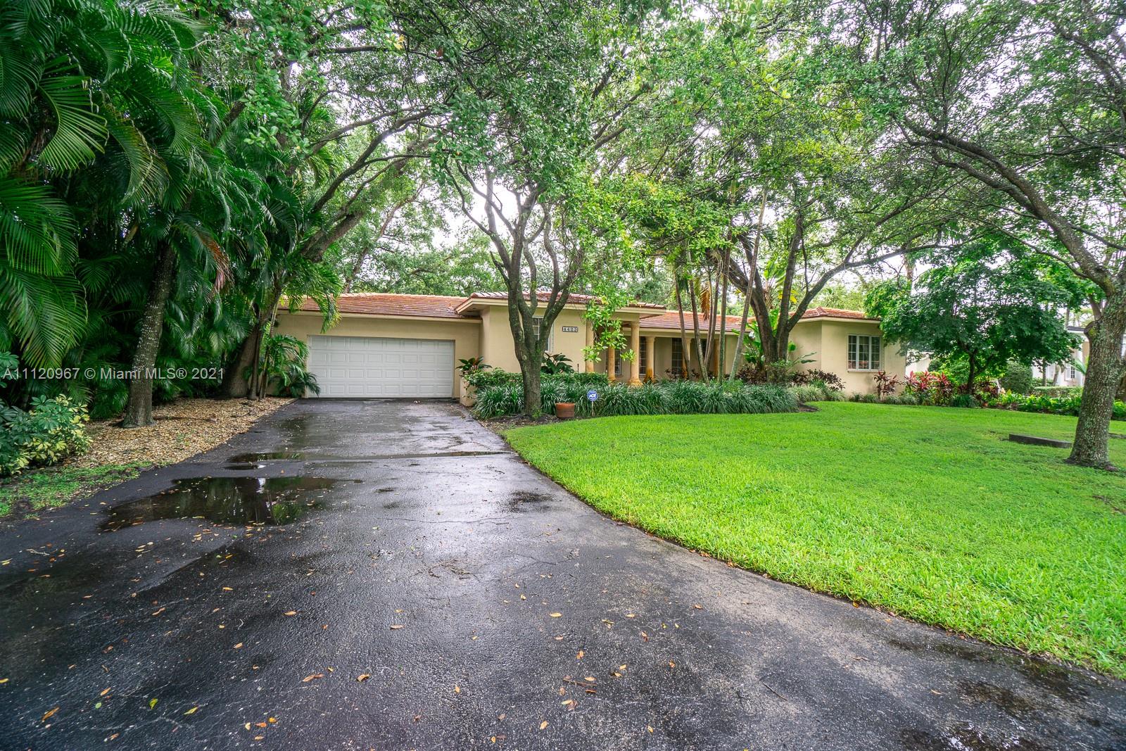 4423 Anderson Road Coral Gables, FL 33146 - Photo 2 of 18 a view of a house with a yard