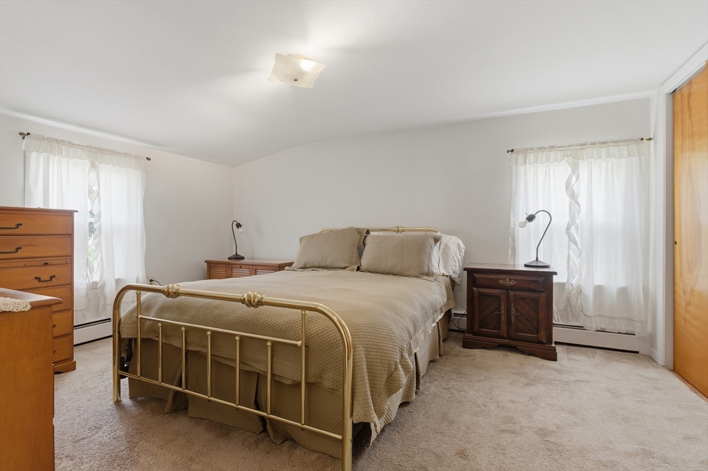 188 Glendale Road Attleboro, MA 02703 - Photo 17 of 37 a bedroom with a bed and a dresser