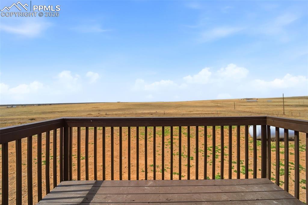 35125 Book Road Yoder, CO 80864 - Photo 45 of 45 a balcony with wooden floor