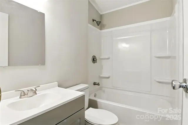a bathroom with a sink toilet and bathtub