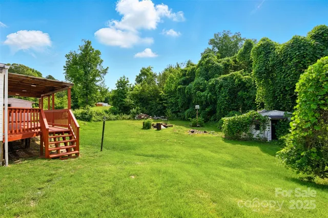 a view of a park with swings and slides