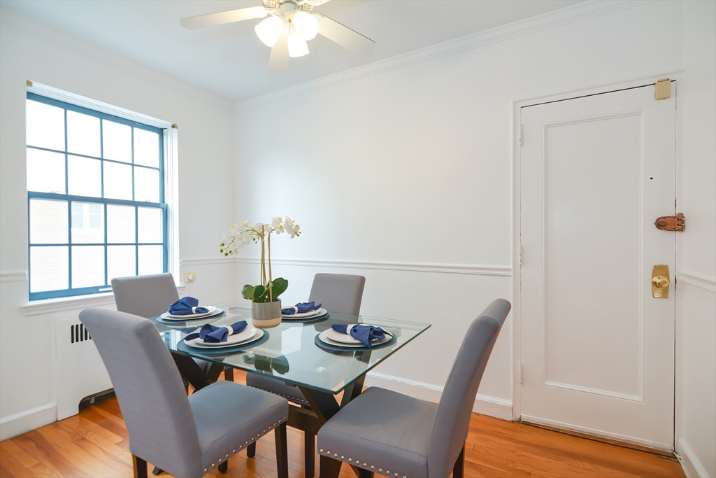 40 Browne Street, Unit 5 Brookline, MA 02446 - Photo 22 of 39 a view of a dining room with furniture window and wooden floor