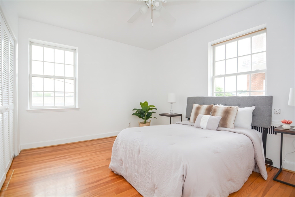 40 Browne Street, Unit 5 Brookline, MA 02446 - Photo 30 of 39 a bedroom with a bed and a window
