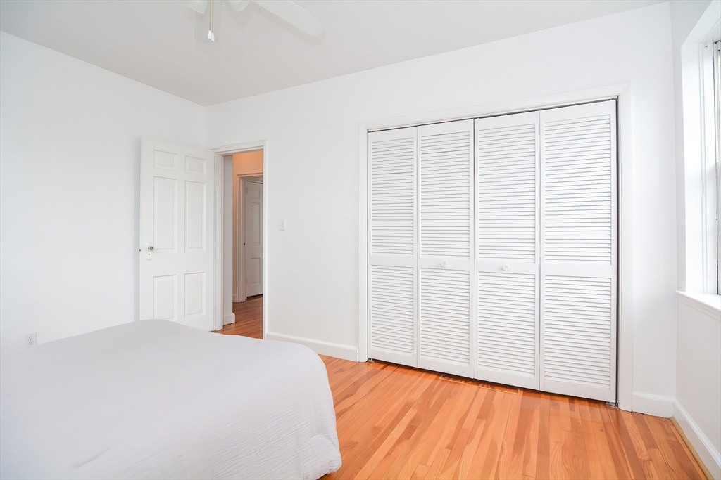 40 Browne Street, Unit 5 Brookline, MA 02446 - Photo 32 of 39 a view of a room with wooden floor
