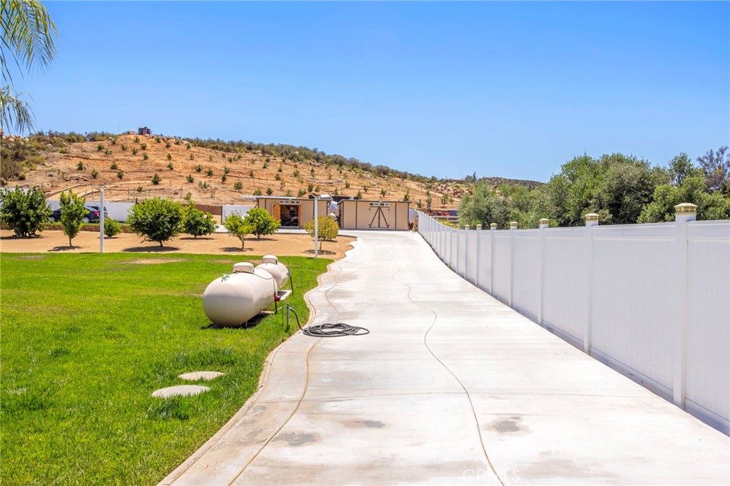 32797 Hayden Road Menifee, CA 92584 - Photo 39 of 51 a view of swimming pool with a yard
