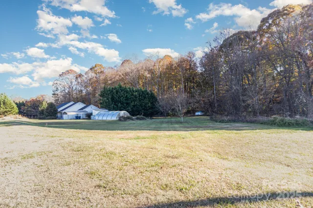 a view of a swimming pool with an outdoor seating